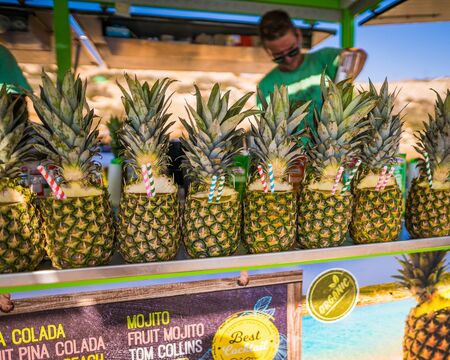 Tropical Pineapple Drinks Stand Selling Island Vacationの写真素材