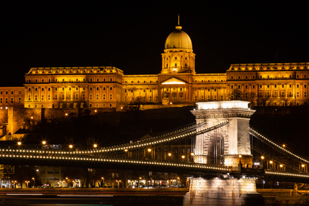 Budapest, Hungary - December 08, 2018:  Hungarian landmarks, Chain Bridge, Royal Palace and Danube river in Budapest at night. Photo Imageのeditorial素材