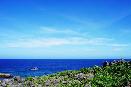blue sky,sea, with boat           の写真素材