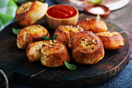 Garlic dinner rolls with marinara dipping sauceの写真素材