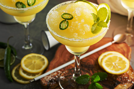Refreshing summer margarita cocktail with fruits and hot pepperの写真素材
