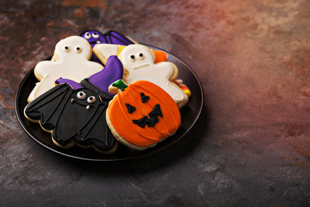 Halloween cookies in the shape of pumpkin, bat, ghost and candy cornの写真素材