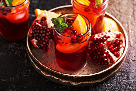 Pomegranate winter or fall sangria with orange juiceの写真素材