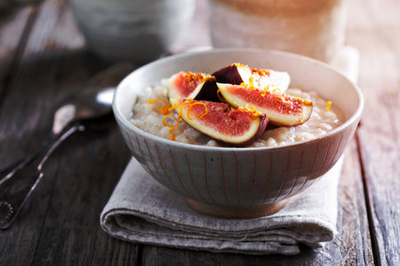 Rice pudding with vanilla, orange zest and fresh figsの写真素材