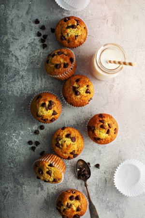 Chocolate chip muffins with milk overhead viewの写真素材