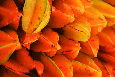 Bright yellow Carambola fruits up for sale also known as Star fruits, selective focus.の写真素材