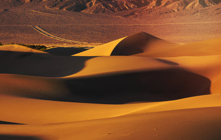 The Mesquite Sand Dunes In Death Valley National Park under evening sun light.の写真素材