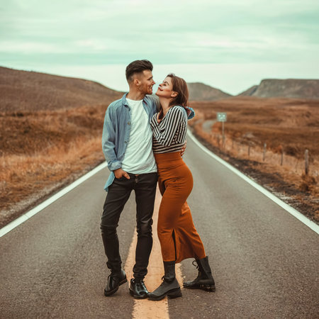 A 9039s style couple in love on road photographyの素材