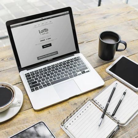 Laptop and gadgets on tableの素材