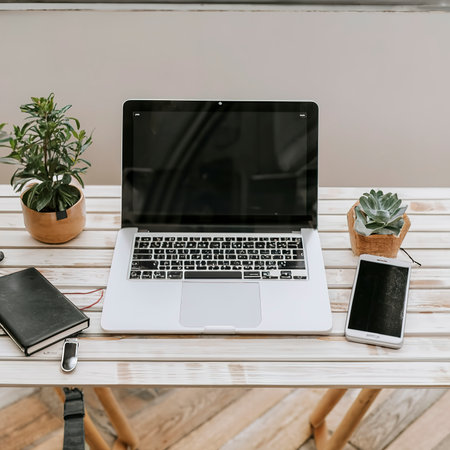 Laptop and gadgets on tableの素材