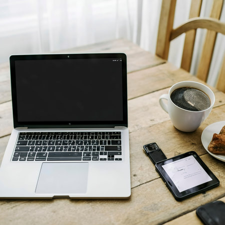Laptop and gadgets on tableの素材