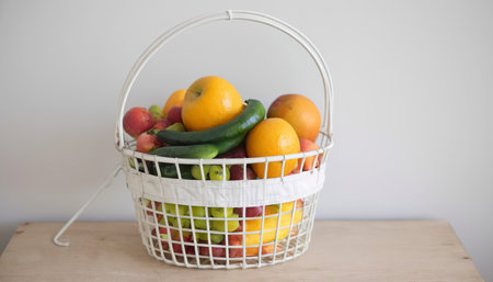 Fruit in white wire basketの素材