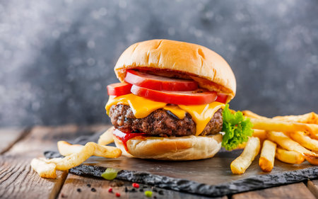 Gourmet fresh delicious homemade hamburger. Grilled gourmet hamburger. American cuisine Fast food.の素材