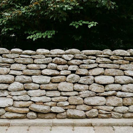 stone fence of solid pieces of stoneの素材