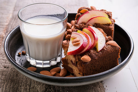 Rye cake with apples and almonds with milkの素材