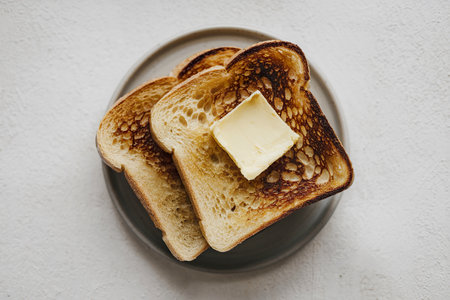 A photo of a slice of toasted breadの写真素材