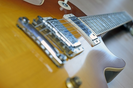 Electric guitar body closeup, neck blurred - の写真素材