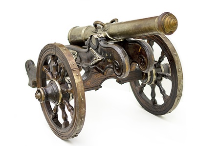 Old cannon isolated on whiteの写真素材