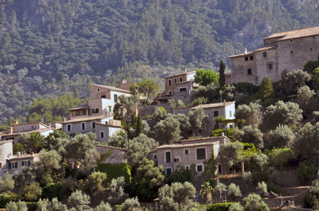 Village in the mountains closeup sunset lights