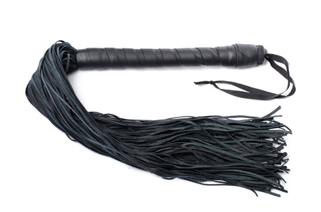 Blacksex erotic leather whip on white backgroundの写真素材