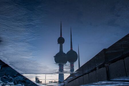 Water reflection of Kuwait Towers on a early morning in Kuwait Cityの写真素材