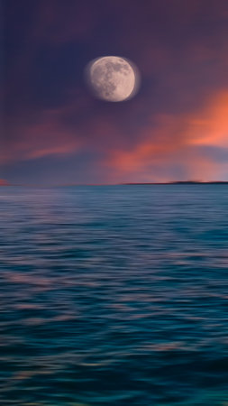 A Stunning Sea as Moon Rises Through the Clouds at Sunset, for Wallpaper. Motion Blurの写真素材