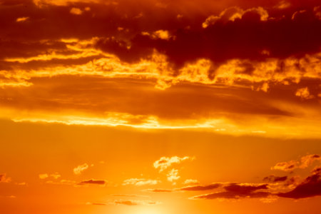 Sunset sky with stunning clouds in the background. Horizontal banner, story.の写真素材