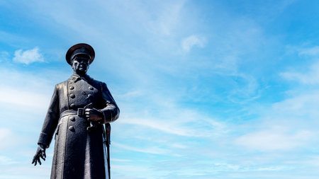 Monumental statue of Ataturk with blue sky background, symbolizing leadership. Ezrurum ,Turkey -...