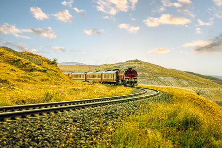 Dogu Ekspresi or The Eastern Express train journeying through the scenic landscapes of Erzurum, symbolizing adventure, exploration, and the beauty of Anatolia.の写真素材