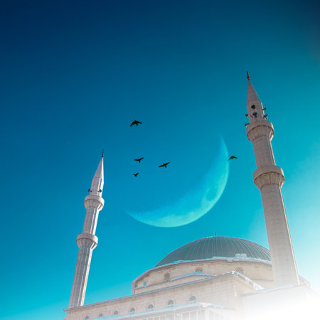 Ramadan or Islamic background photo featuring Haci Osman Efendi Mosque, Erzurum, with crescent moon, birds, and a serene blue sky.の写真素材