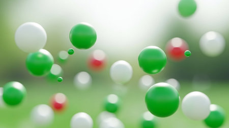 Green and white spheres floating in the air with bokeh backgroundの素材