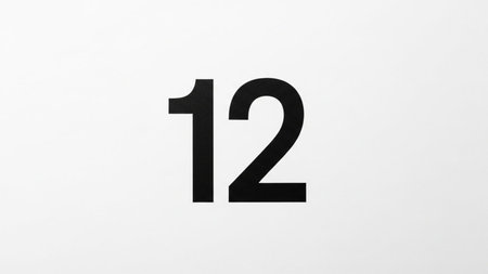 The image features a large, bold representation of the number twelve. The number is prominently displayed in the center of the image, with a clean and minimalistic design. The number twelve is rendered in a simple, sans-serif font and is black in color, standing out against a white background.の素材