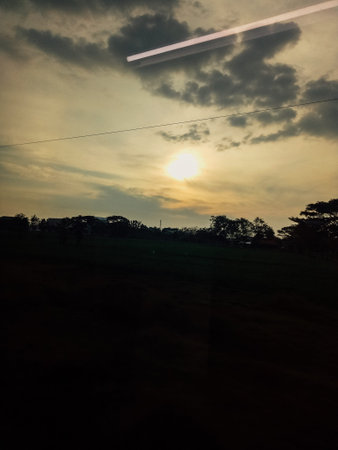 The beautiful appearance of the sun in the expanse of the sky at sunset