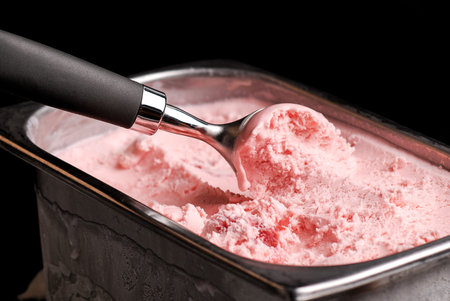 strawberry ice cream scoop trays black background