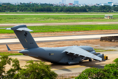 Ho Chi Minh City, Vietnam - May 1, 2022 : A Boeing C-17A Globemaster III Aircraft Of Royal Australian Air Force Moved To Runway By Pushback Tractor In Tan Son Nhat International Aiのeditorial素材