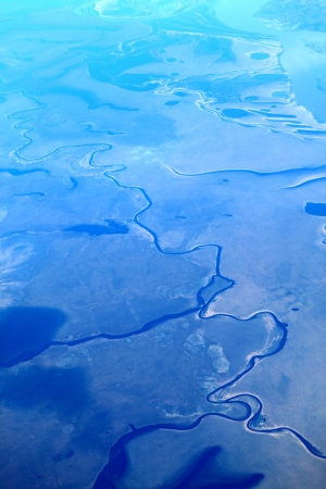  Aerial view of lush coastal wetlands の写真素材