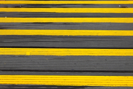 Wooden staircase with yellow paintの写真素材