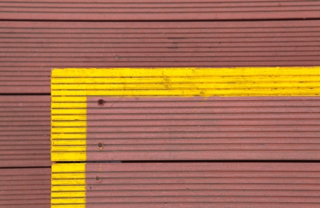 Wooden staircase with yellow paintの写真素材
