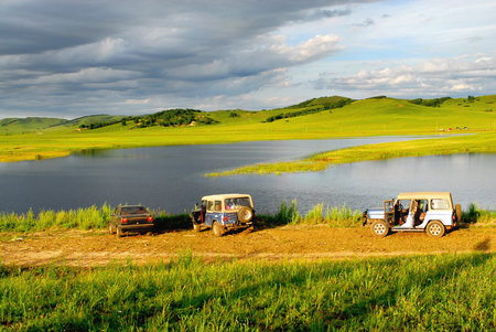 Fields and car