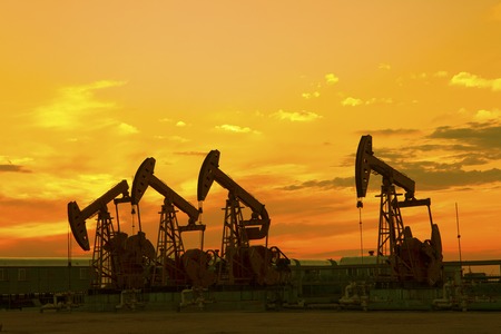 Oil Pump on orange sunsetのeditorial素材