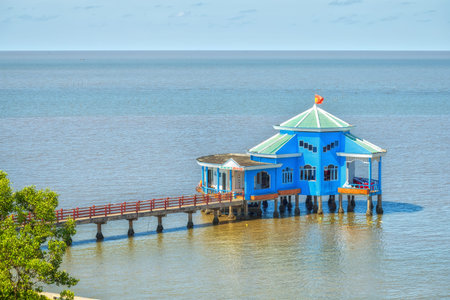 Ca Mau, Vietnam - April 7th, 2015: Floating restaurant on the bay with a restaurant guide giá»¯a...