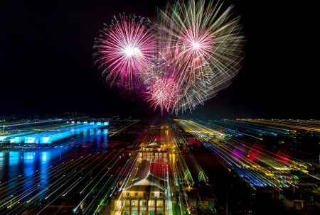 Ho Chi Minh City, Vietnam - September 2nd, 2015: Fireworks in big sky bloom beautifully. Each year large sums of state Costs to Attract People come here display contemplates in Ho Chi Minh, Vietnamのeditorial素材