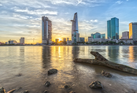 Ho Chi Minh City, Vietnam - November 20, 2015: Sunny afternoon in City with sunlight path through sanctifying sun later in day to make more city commercial vitality and development center in Ho Chi Minh city, Vietnamのeditorial素材