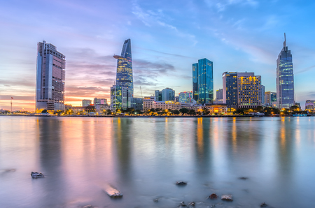 Ho Chi Minh City, Vietnam - November 20th, 2015: Sunset sun sets and night khi moment lights from buildings kh?i Bustle of Saigon brightly at night full of dynamism and young city developmentのeditorial素材