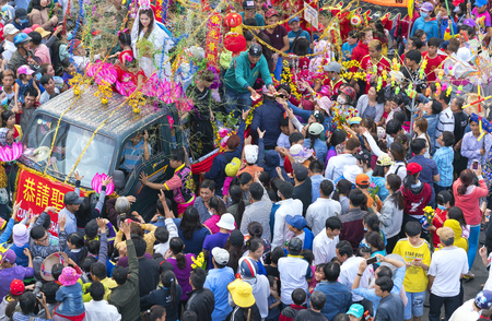 Binh Duong, Vietnam - February 11th, 2017: Chinese Lantern Festival with colorful dragons, lion, flags, cars, marched in the streets attracted crowd. This traditional festivals ethnic Chinese in Vietnamのeditorial素材