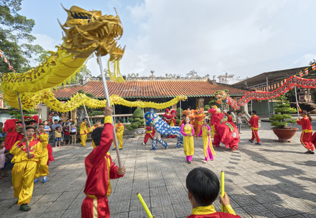 Binh Duong, Vietnam - February 5th, 2017: Festival in the old temple has beautiful architecture with dance dragon martial arts students performed in Chinese Lantern Festival in Binh Duong, Vietnamのeditorial素材