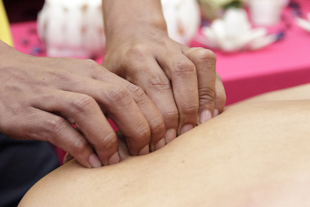 Sports massage - Arm massage - Physical therapist doing massage of arms. Toned image, selective focus set on hands.の写真素材