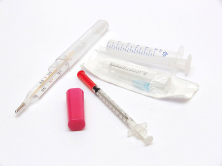 Medical syringes and thermometer for gauging a body temperature