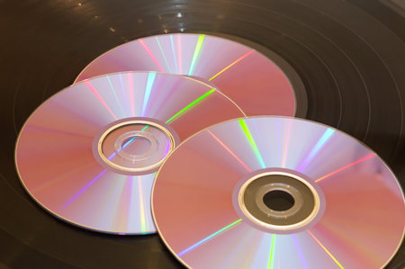 Old musical vinyls disks and compact DVD's (CD)