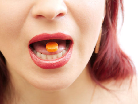 Tablet in a mouthの写真素材